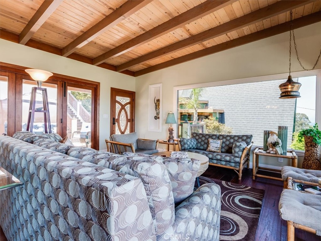 430 Olive Street Morro Bay, CA 93442 - Photo 6 of 68 a living room with furniture large window and wooden floor