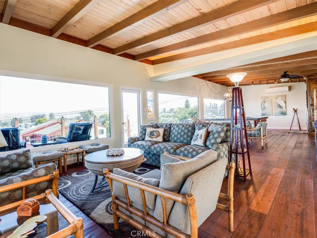 430 Olive Street Morro Bay, CA 93442 - Photo 8 of 68 a outdoor space with furniture and wooden floor