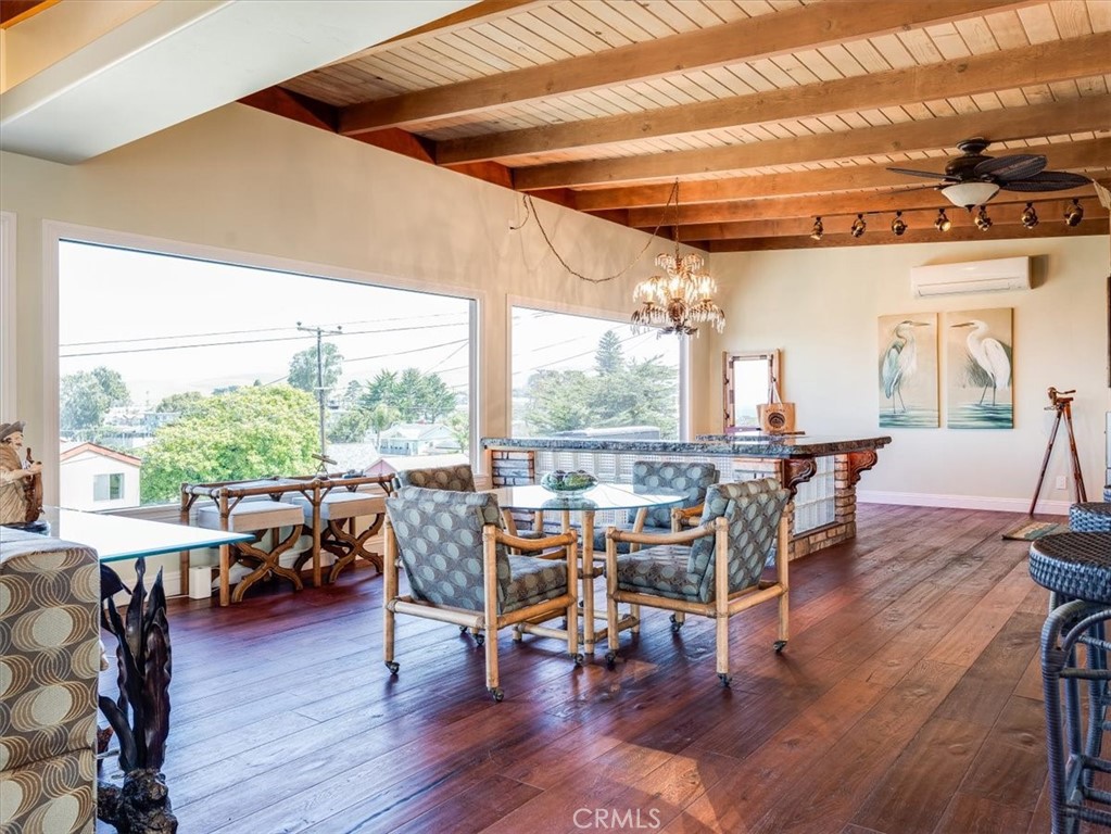 430 Olive Street Morro Bay, CA 93442 - Photo 9 of 68 a view of a dining room with furniture window and wooden floor