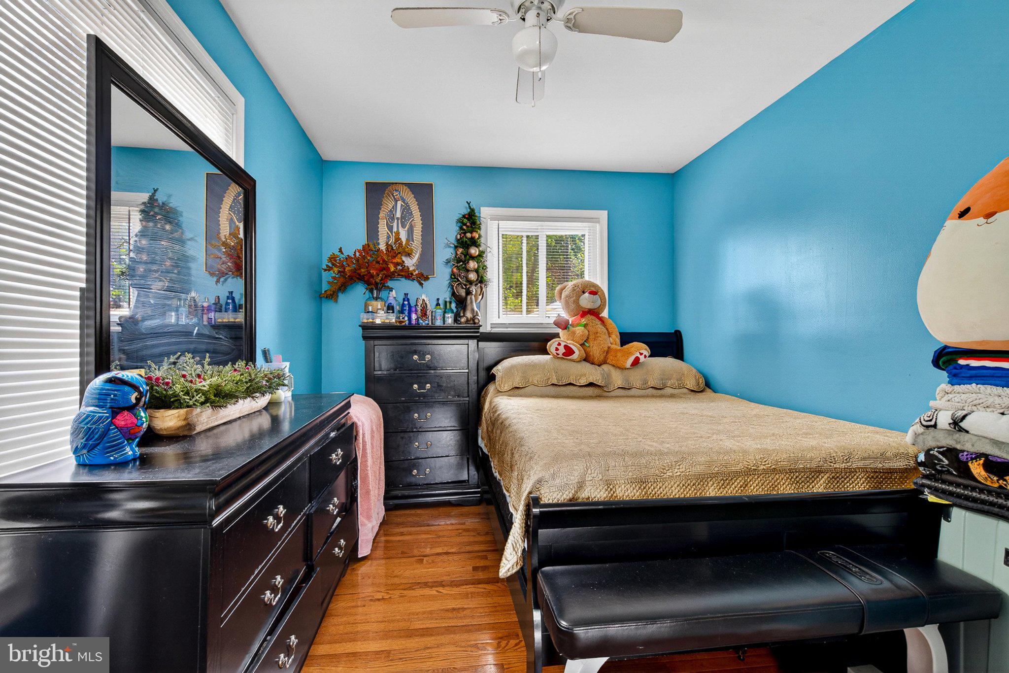 3947 Susanna Road Randallstown, MD 21133 - Photo 13 of 52 Cozy retreat with vibrant blue walls.