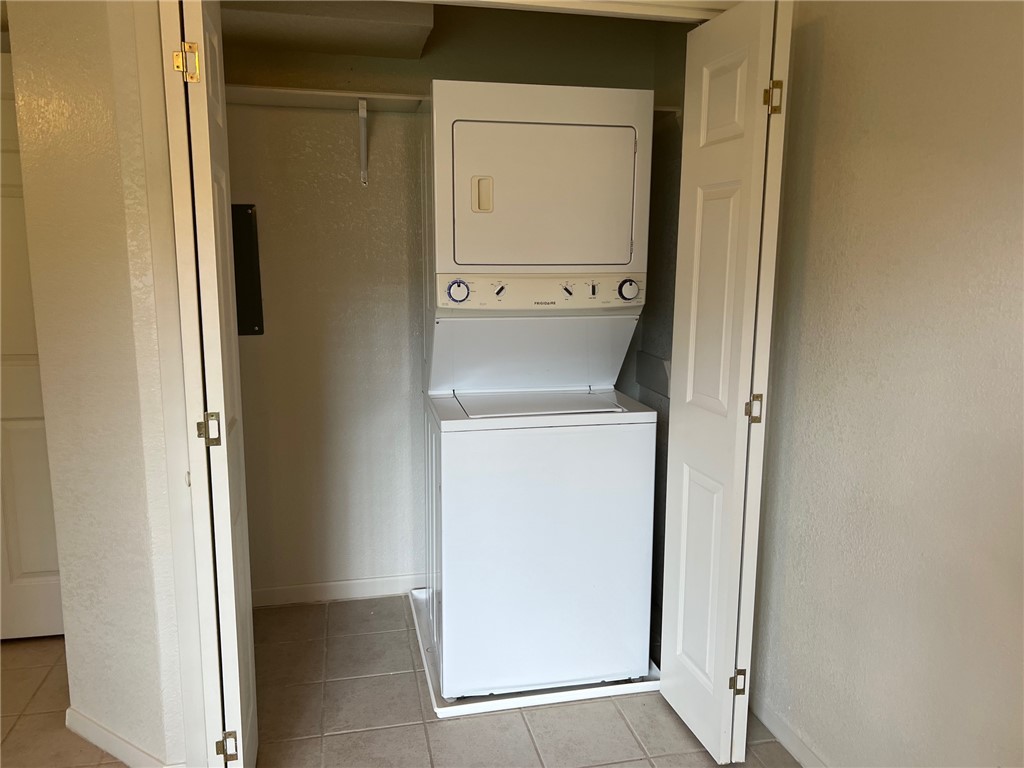 808 Natalie Street, Unit A Bryan, TX 77801 - Photo 2 of 8 a utility room with dryer and washer
