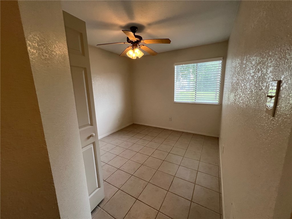 808 Natalie Street, Unit A Bryan, TX 77801 - Photo 3 of 8 a view of an empty room with a window