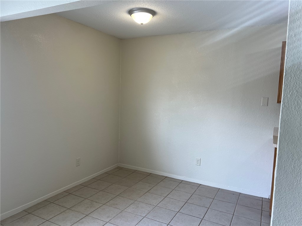 808 Natalie Street, Unit A Bryan, TX 77801 - Photo 8 of 8 a view of an empty room