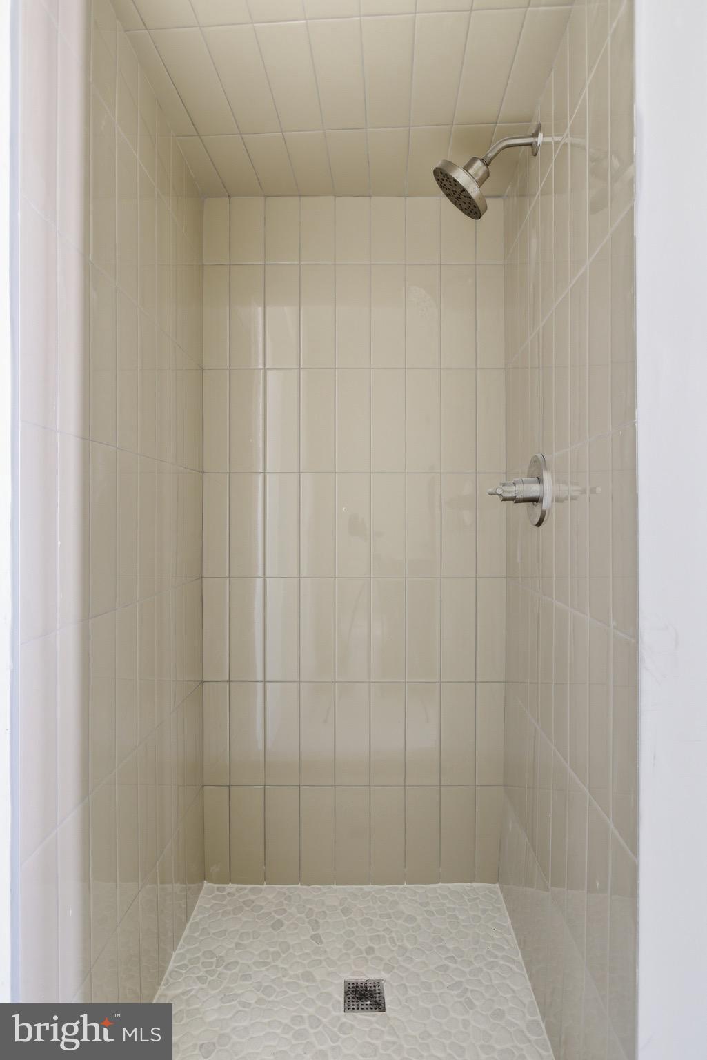 5939 Drexel Road, Unit 1 Philadelphia, PA 19131 - Photo 13 of 16 a bathroom with a shower