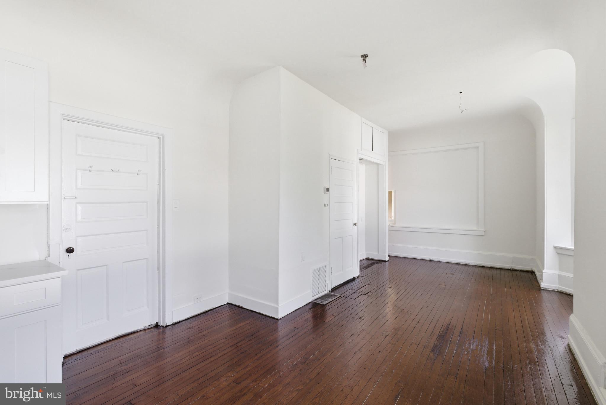 5939 Drexel Road, Unit 1 Philadelphia, PA 19131 - Photo 2 of 16 a view of an empty room with wooden floor