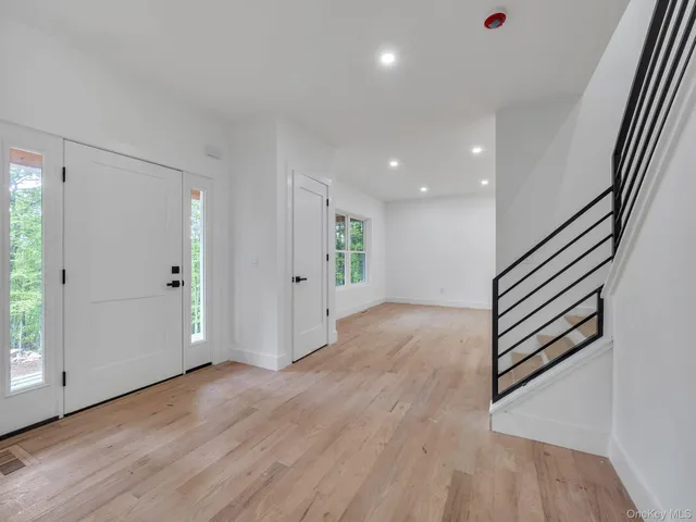 an entryway in a hall with an entryway