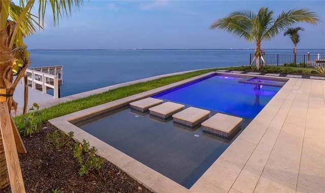 a front view of a house with swimming pool