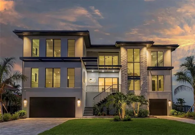 a view of a kitchen with wooden floor and furniture