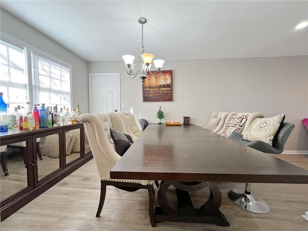 6520 Roswell Road, Unit 3 Atlanta, GA 30328 - Photo 20 of 47 a view of a dining room with furniture