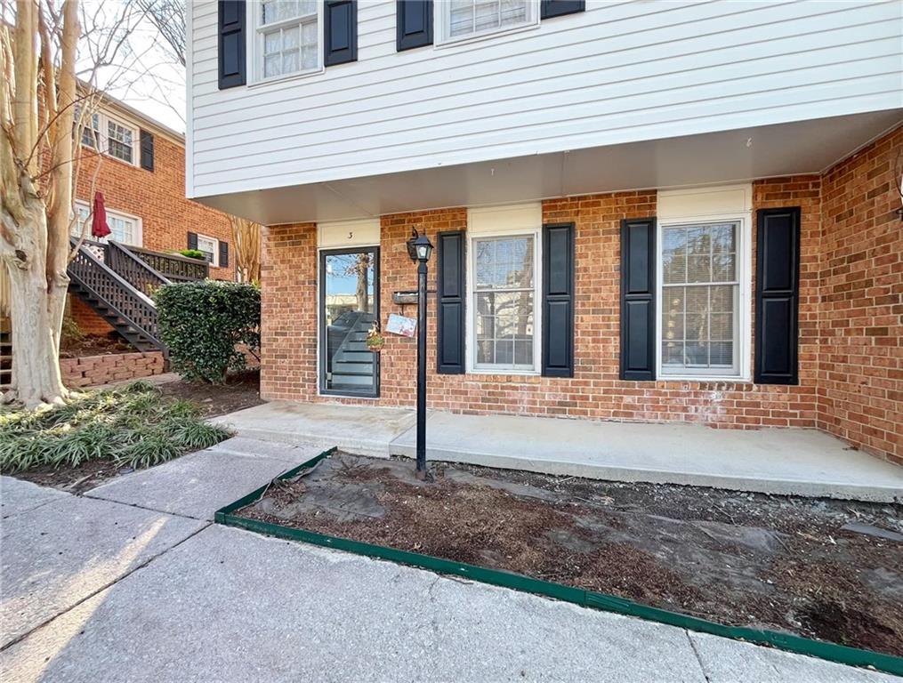 6520 Roswell Road, Unit 3 Atlanta, GA 30328 - Photo 2 of 47 a house view with a outdoor space