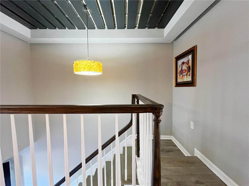 6520 Roswell Road, Unit 3 Atlanta, GA 30328 - Photo 22 of 47 a view of staircase with wooden floor