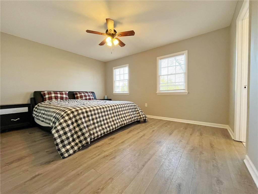 6520 Roswell Road, Unit 3 Atlanta, GA 30328 - Photo 23 of 47 a bedroom with a bed and window