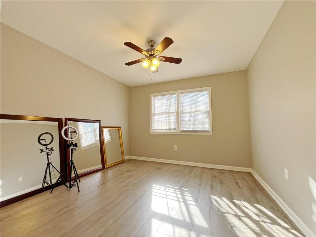 6520 Roswell Road, Unit 3 Atlanta, GA 30328 - Photo 29 of 47 a view of an empty room with a window