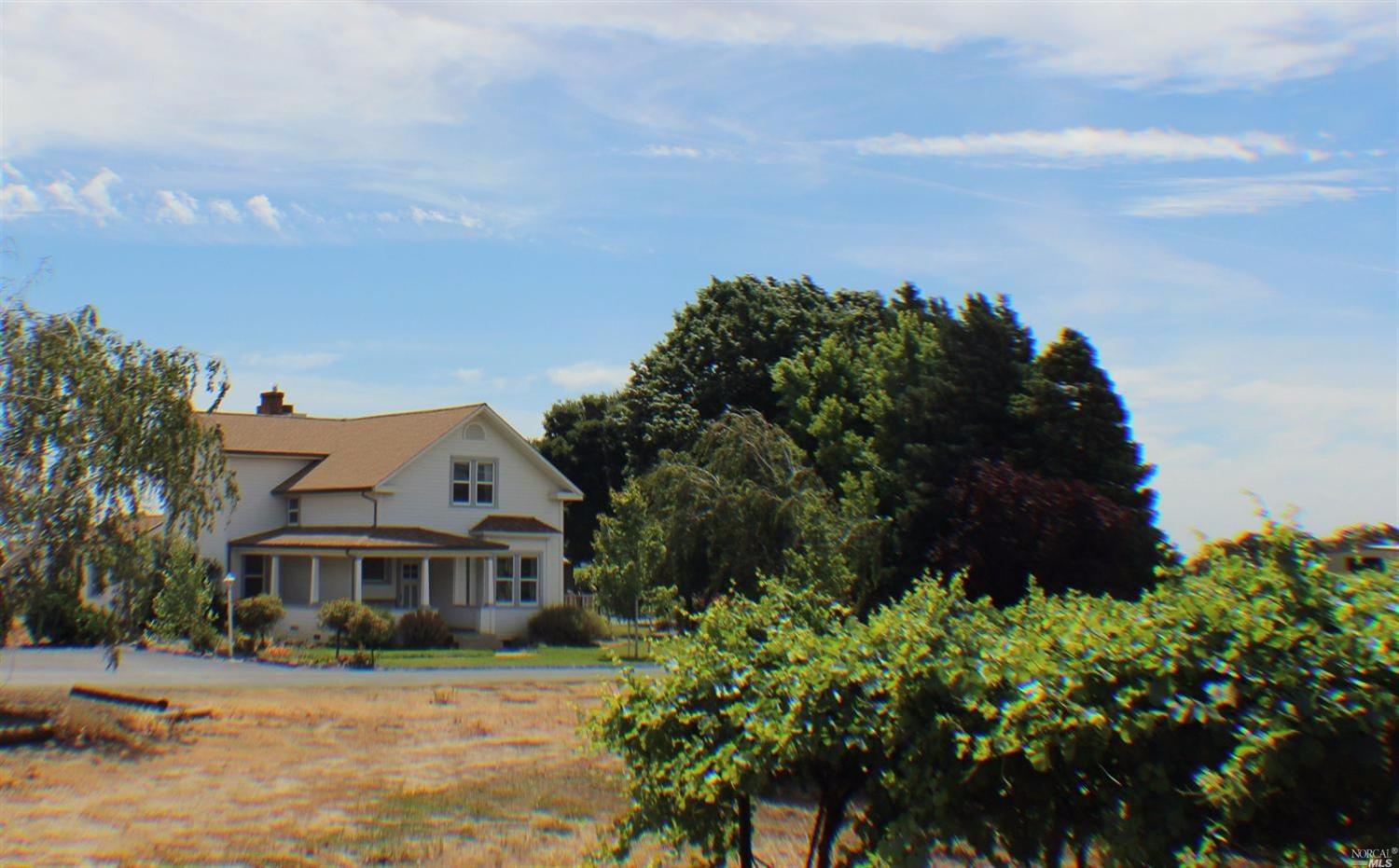4556 Suisun Valley Road Fairfield, CA 94534 - Photo 1 of 1 Front View Of Home & Vineyard