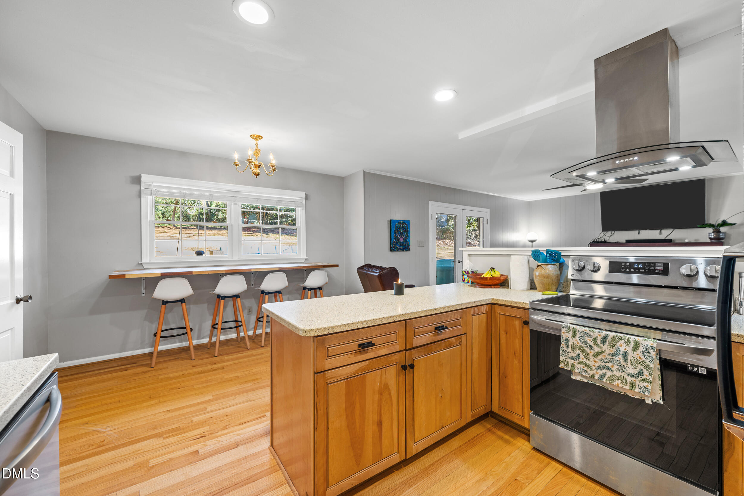 3726 Swift Drive Raleigh, NC 27606 - Photo 12 of 40 a kitchen with a sink appliances and cabinets