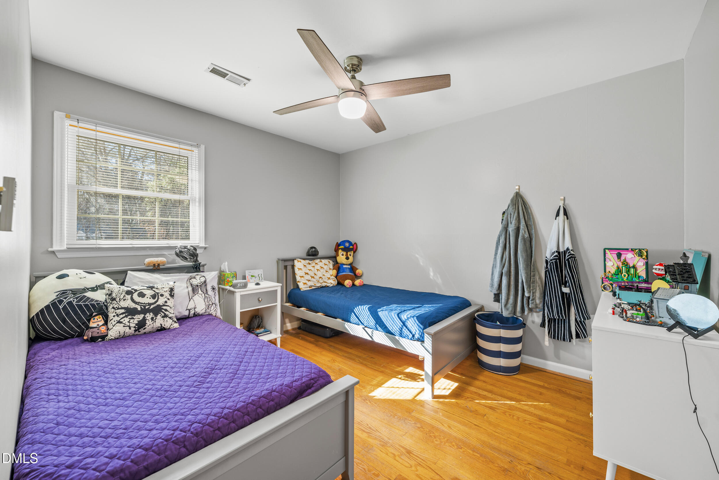 3726 Swift Drive Raleigh, NC 27606 - Photo 21 of 40 a bedroom with bed and a window