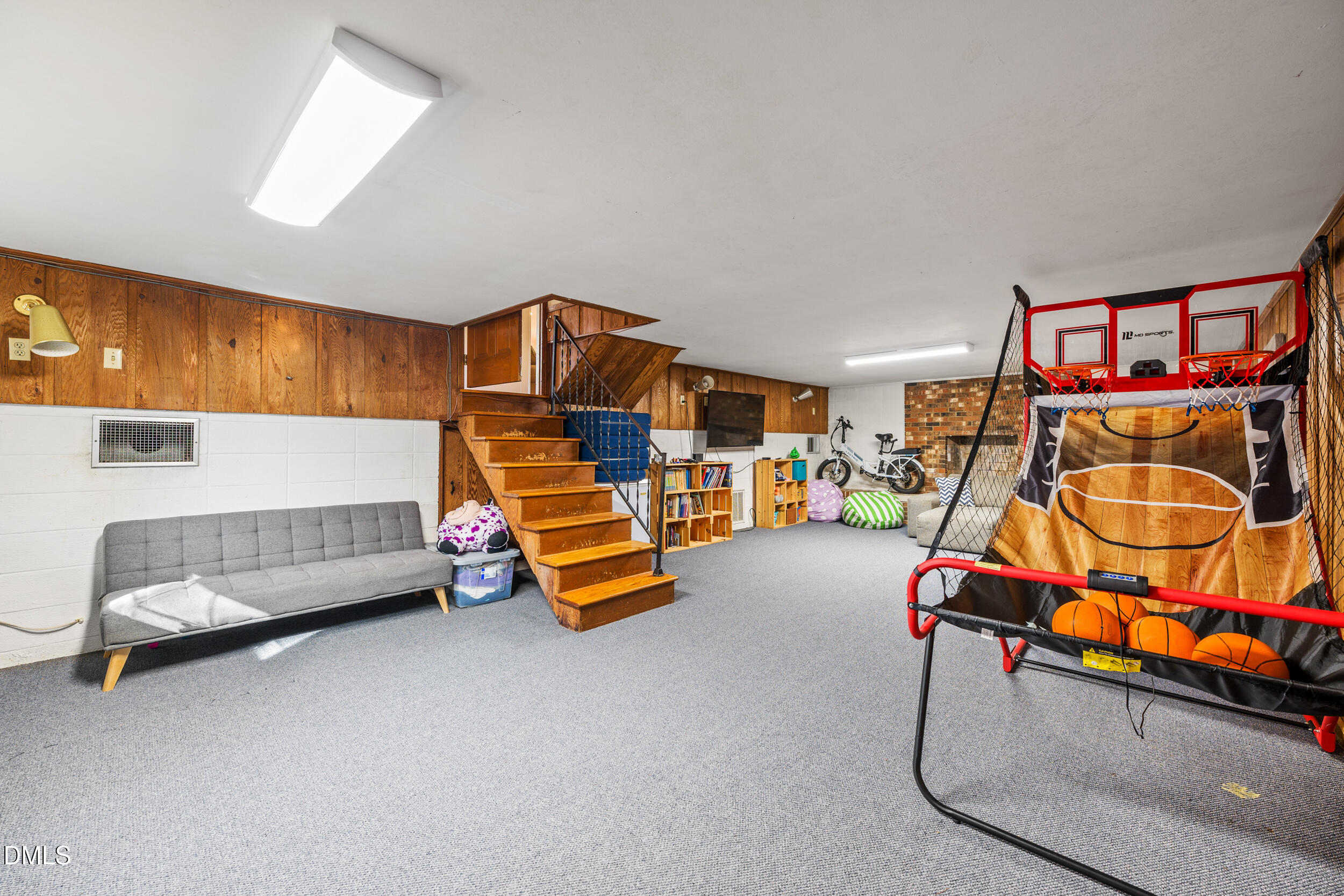 3726 Swift Drive Raleigh, NC 27606 - Photo 27 of 40 a living room with furniture and gym equipment