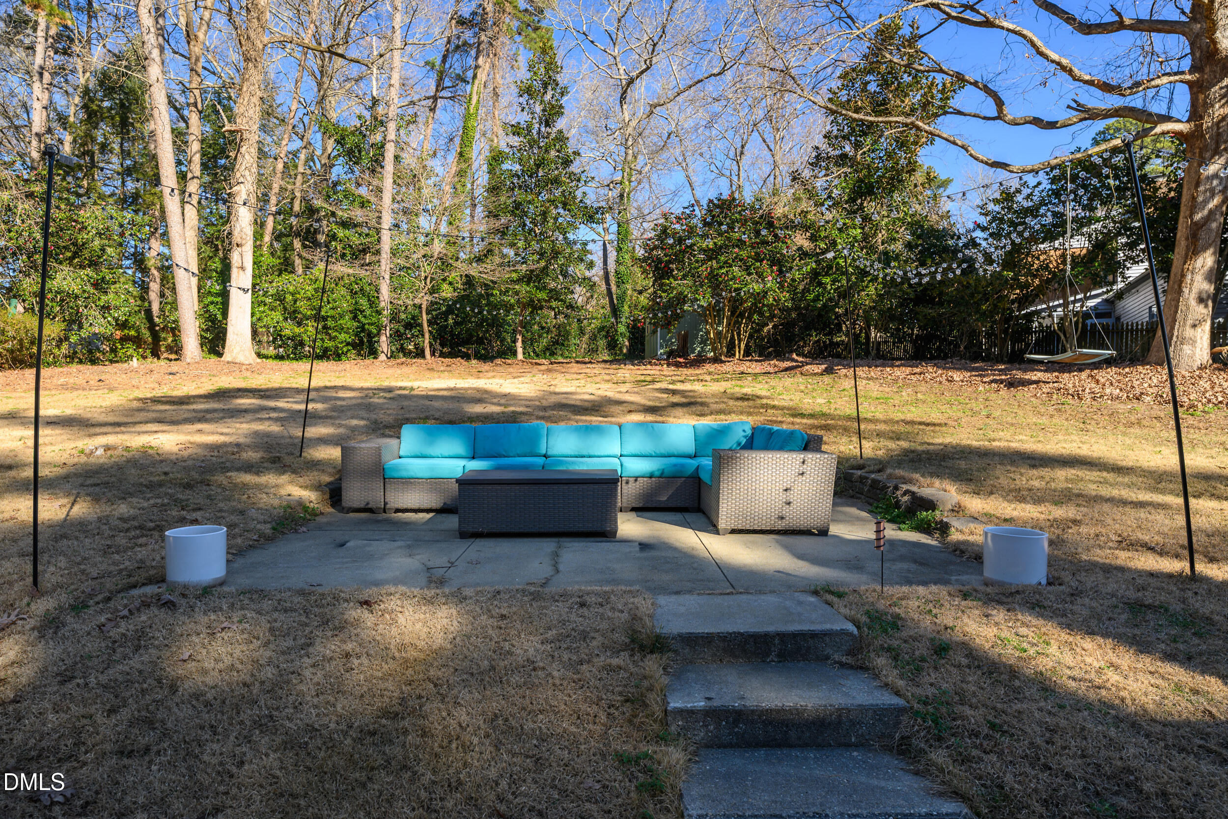 3726 Swift Drive Raleigh, NC 27606 - Photo 31 of 40 a view of a yard with an outdoor seating