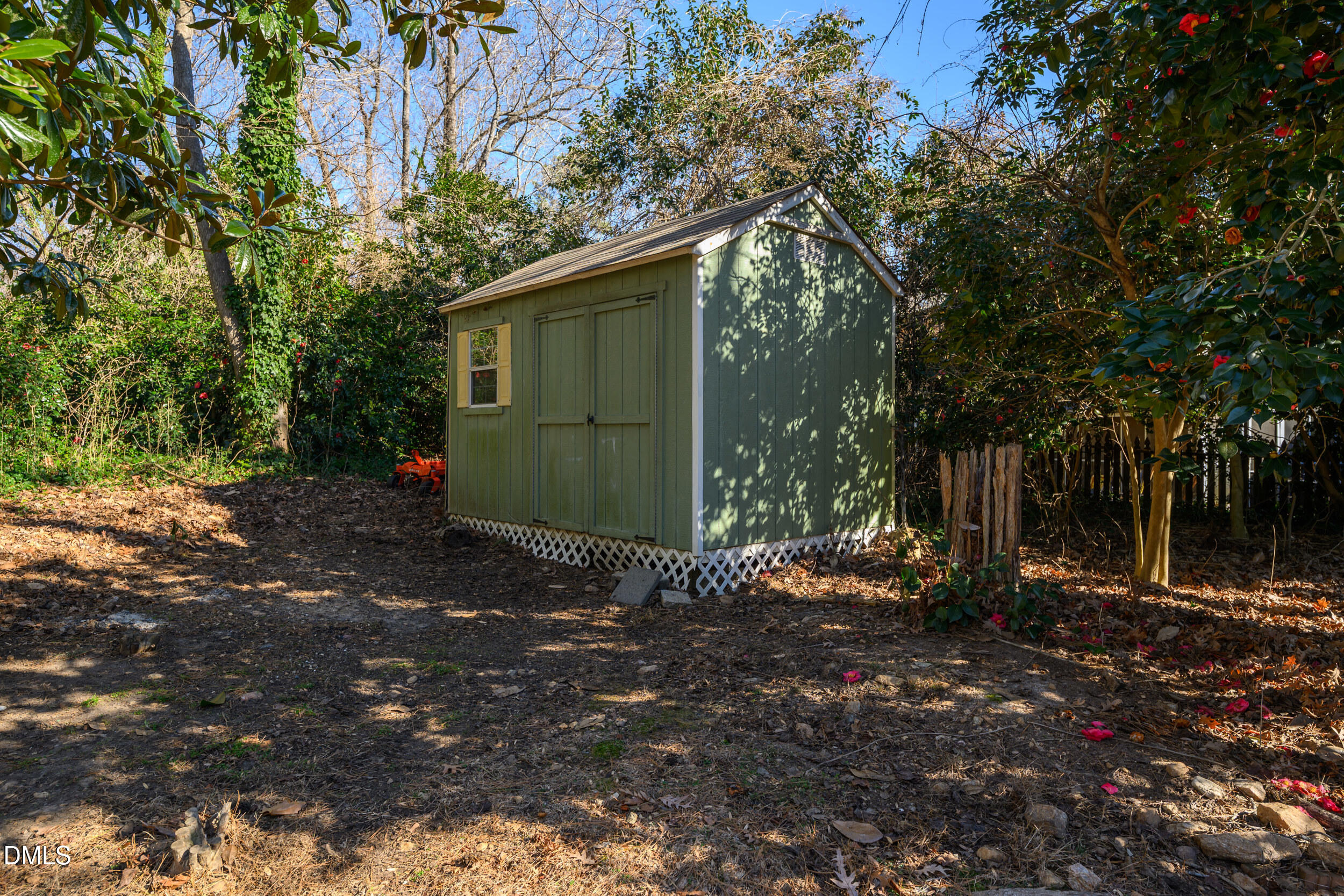 3726 Swift Drive Raleigh, NC 27606 - Photo 33 of 40 a view of a barn house in the middle of forest
