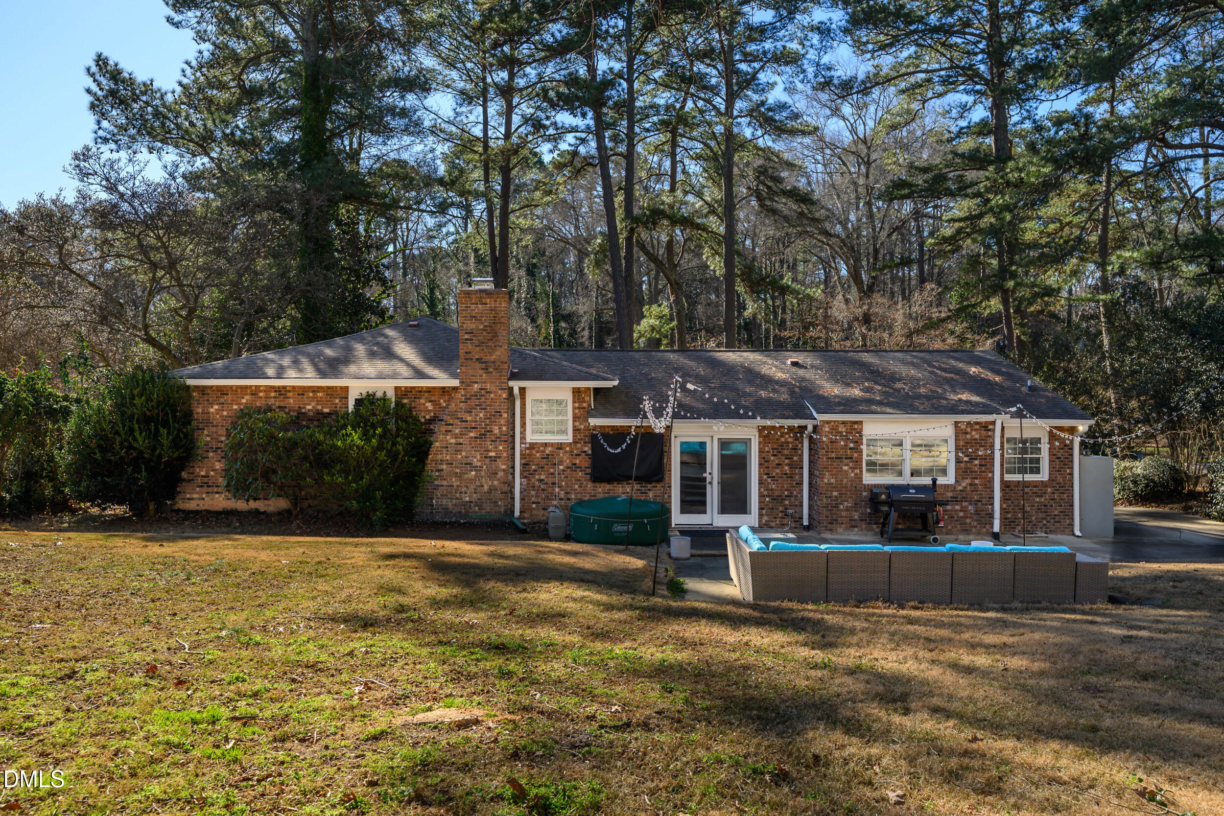 3726 Swift Drive Raleigh, NC 27606 - Photo 34 of 40 front view of a house next to a yard