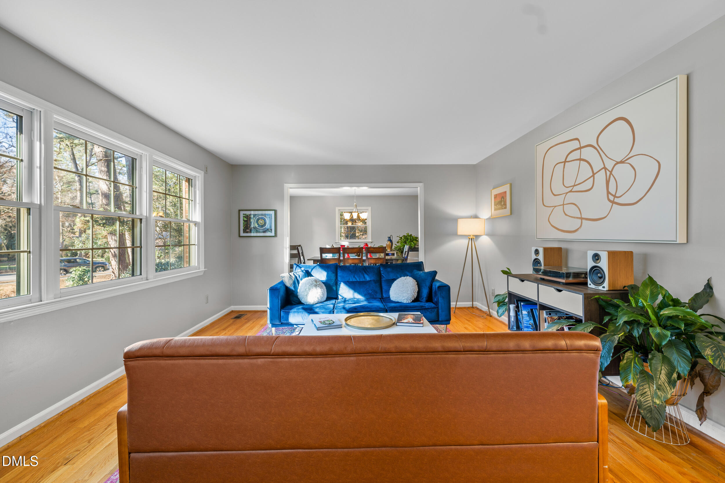 3726 Swift Drive Raleigh, NC 27606 - Photo 4 of 40 a living room with furniture and a large window