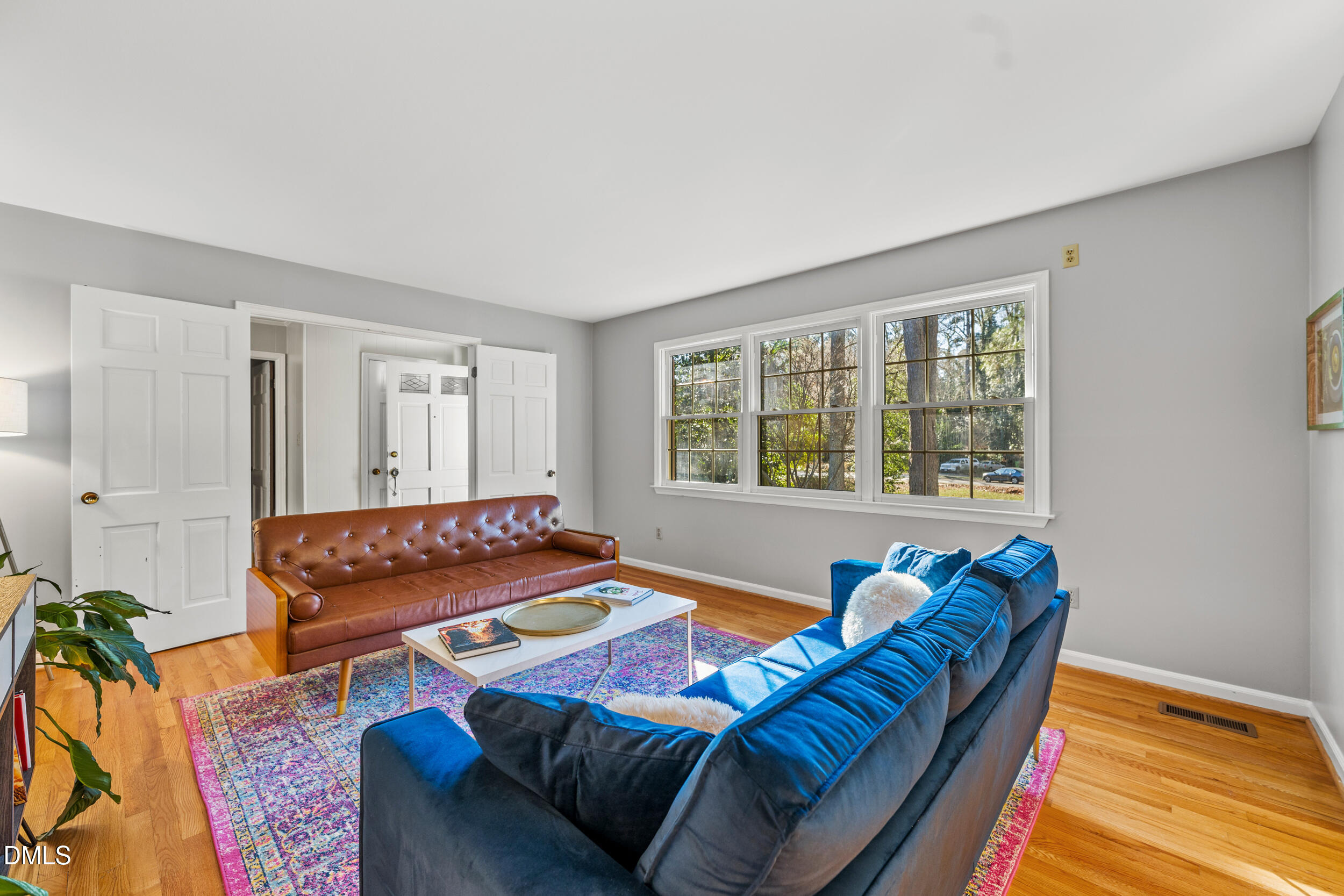 3726 Swift Drive Raleigh, NC 27606 - Photo 6 of 40 a living room with furniture and a window