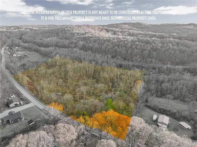 a view of a yard from a balcony