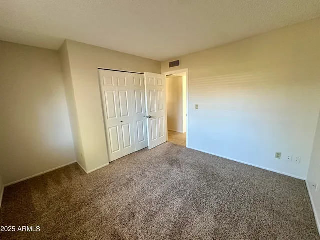 an empty room with a natural light