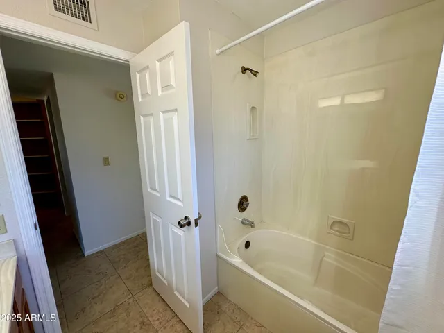 a bathroom with a bathtub