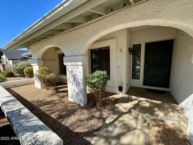 a view of house with patio