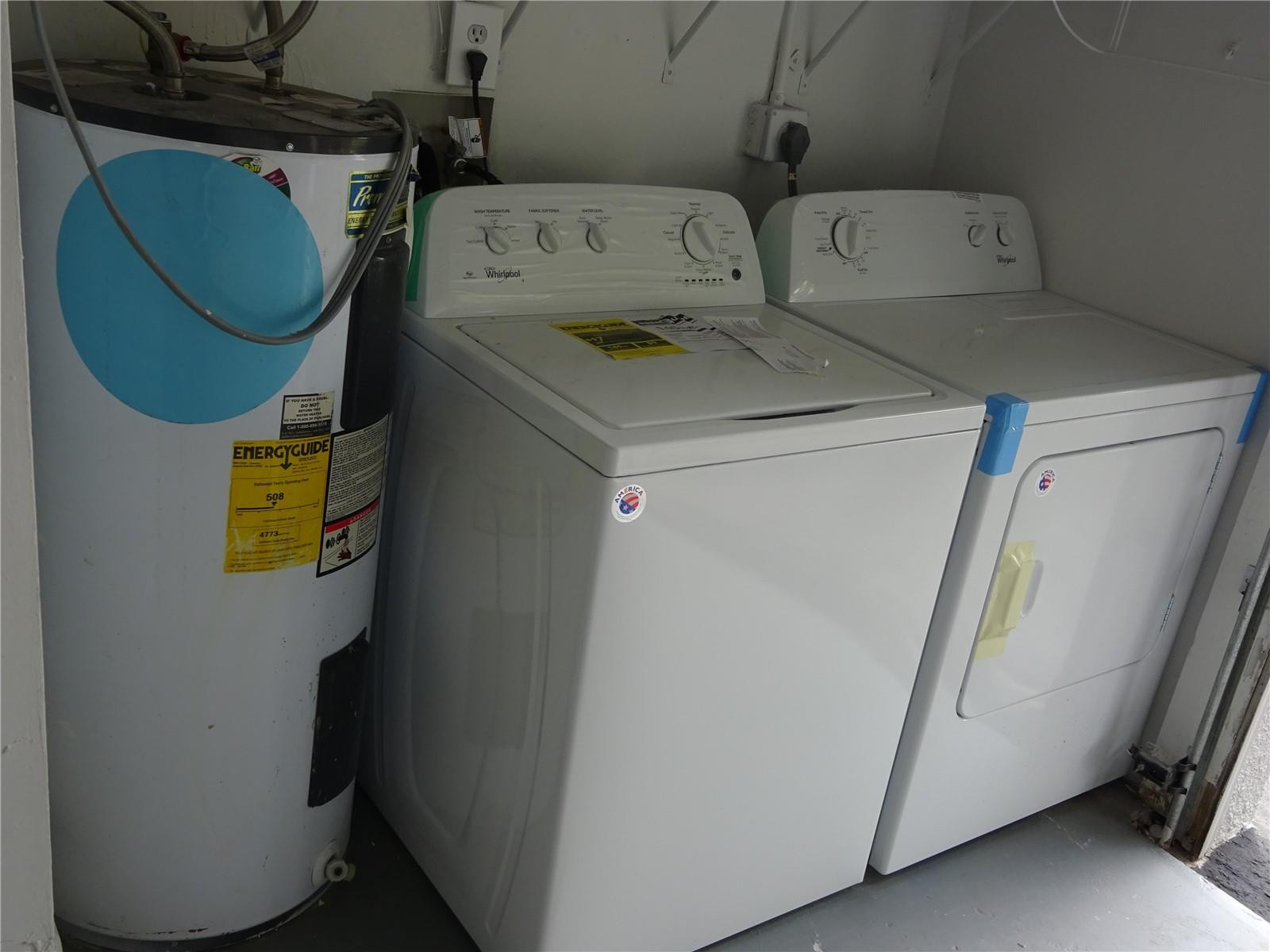 9713 Carousel Circle West Boca Raton, FL 33434 - Photo 49 of 59 a utility room with dryer and washer
