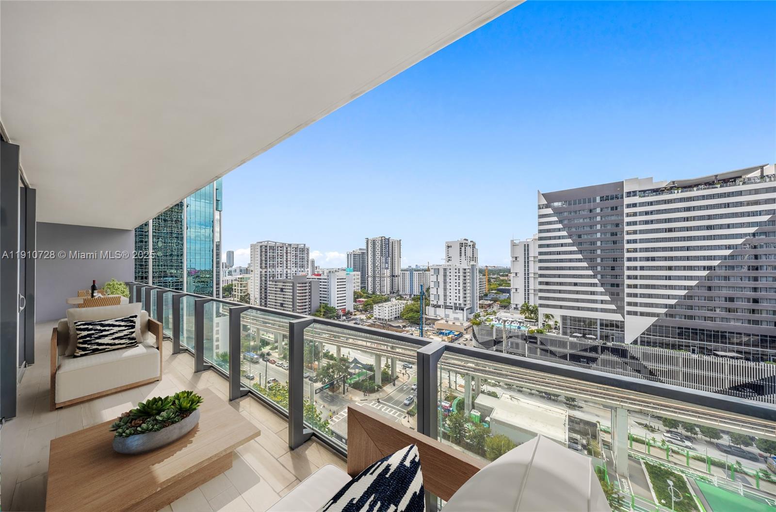 88 Southwest 7th Street, Unit 1004 Miami, FL 33130 - Photo 3 of 40 a view of a terrace with chairs