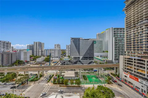 a view of city with tall buildings