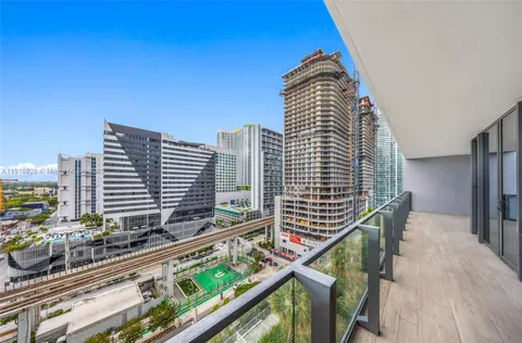 a view of city with tall buildings