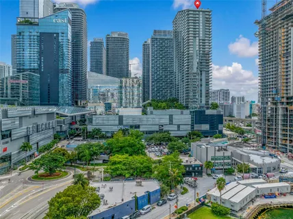 a view of city with tall buildings