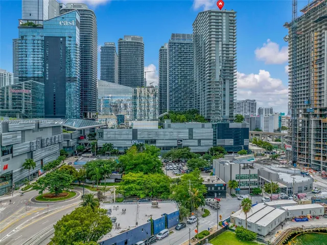 a view of city with tall buildings