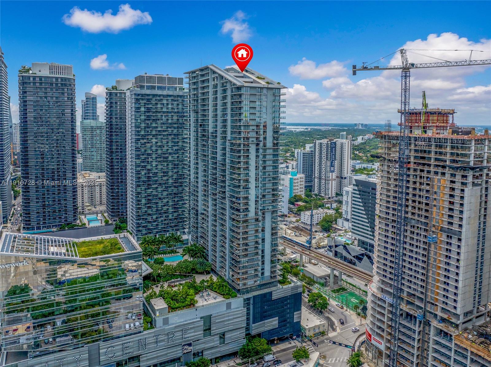 88 Southwest 7th Street, Unit 1004 Miami, FL 33130 - Photo 38 of 40 a view of a city with tall buildings