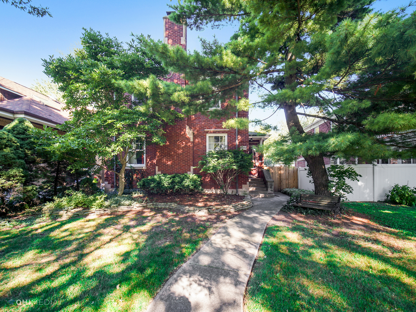 a backyard of a house with lots of green space