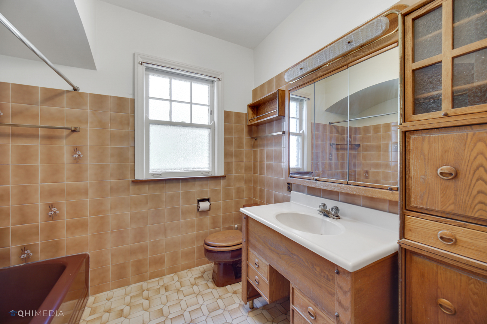 10151 South Bell Avenue Chicago, IL 60643 - Photo 14 of 22 a bathroom with a sink and a mirror