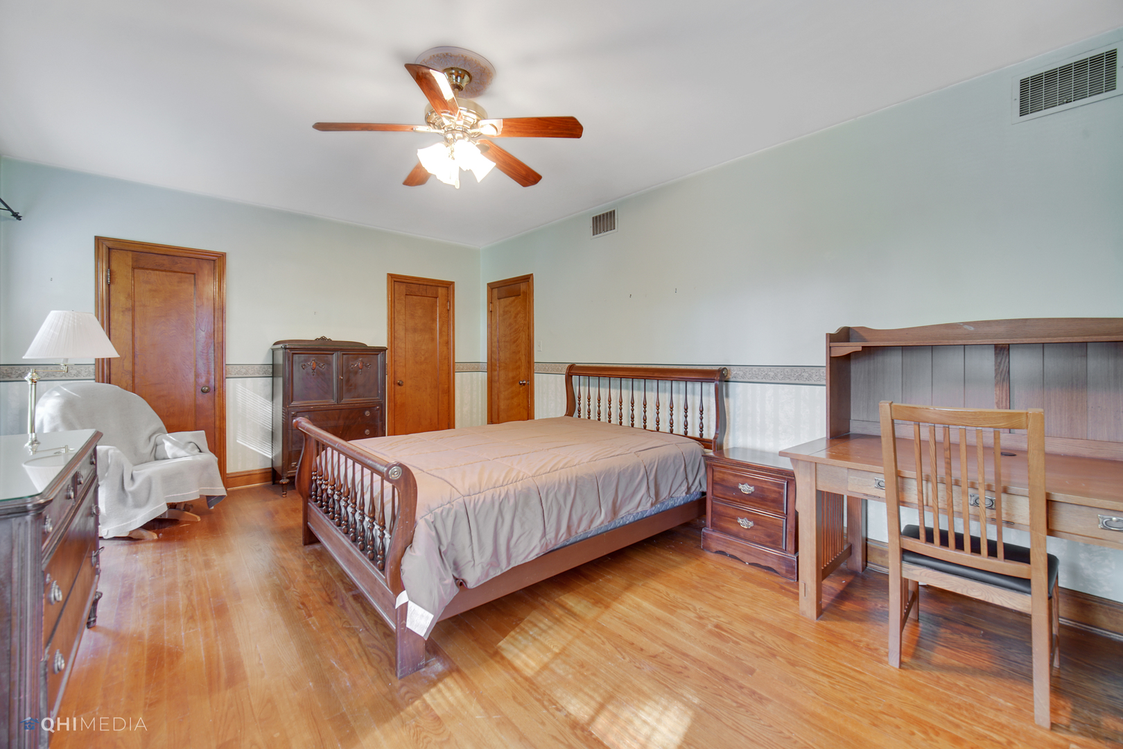10151 South Bell Avenue Chicago, IL 60643 - Photo 15 of 22 a bedroom with a bed and a chandelier