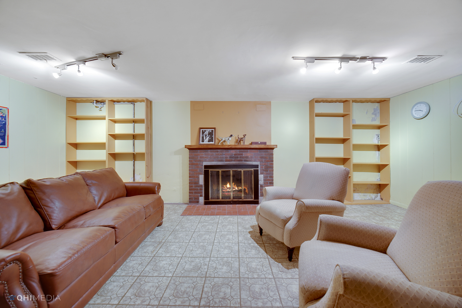 10151 South Bell Avenue Chicago, IL 60643 - Photo 20 of 22 a living room with furniture and a fireplace