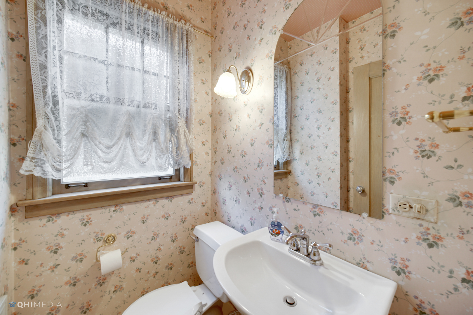 10151 South Bell Avenue Chicago, IL 60643 - Photo 10 of 22 a bathroom with a sink and a mirror