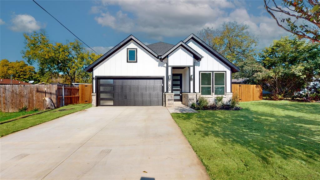 1609 Sharon Street Arlington, TX 76010 - Photo 1 of 29 a front view of house with yard and green space