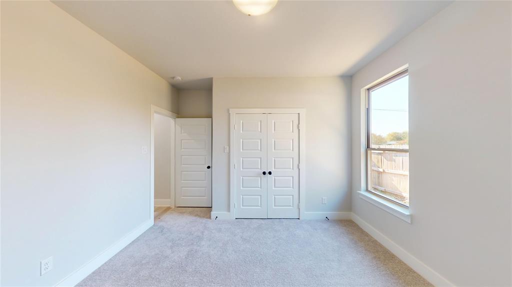 1609 Sharon Street Arlington, TX 76010 - Photo 16 of 29 a view of an empty room with a window