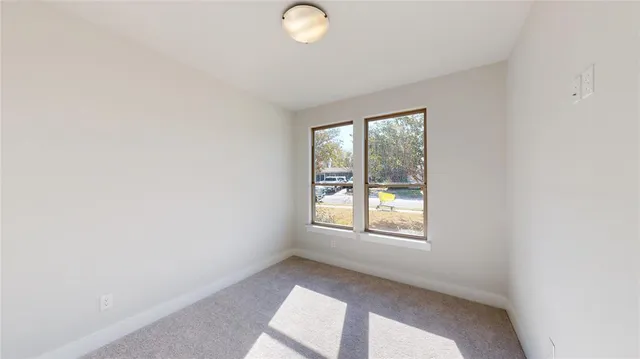 a bathroom with a double vanity sink a mirror and a shower