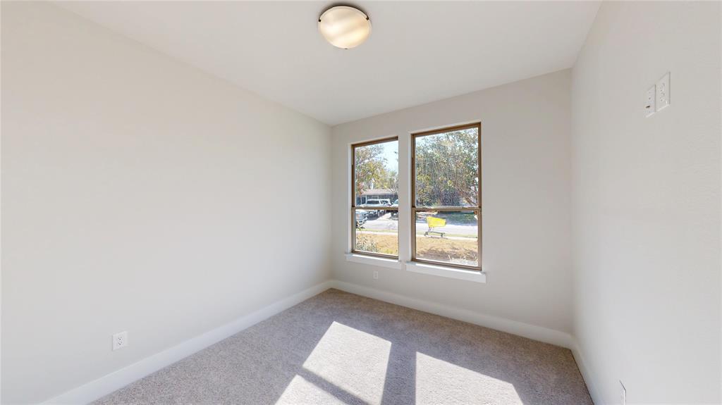 1609 Sharon Street Arlington, TX 76010 - Photo 17 of 29 an empty room with windows