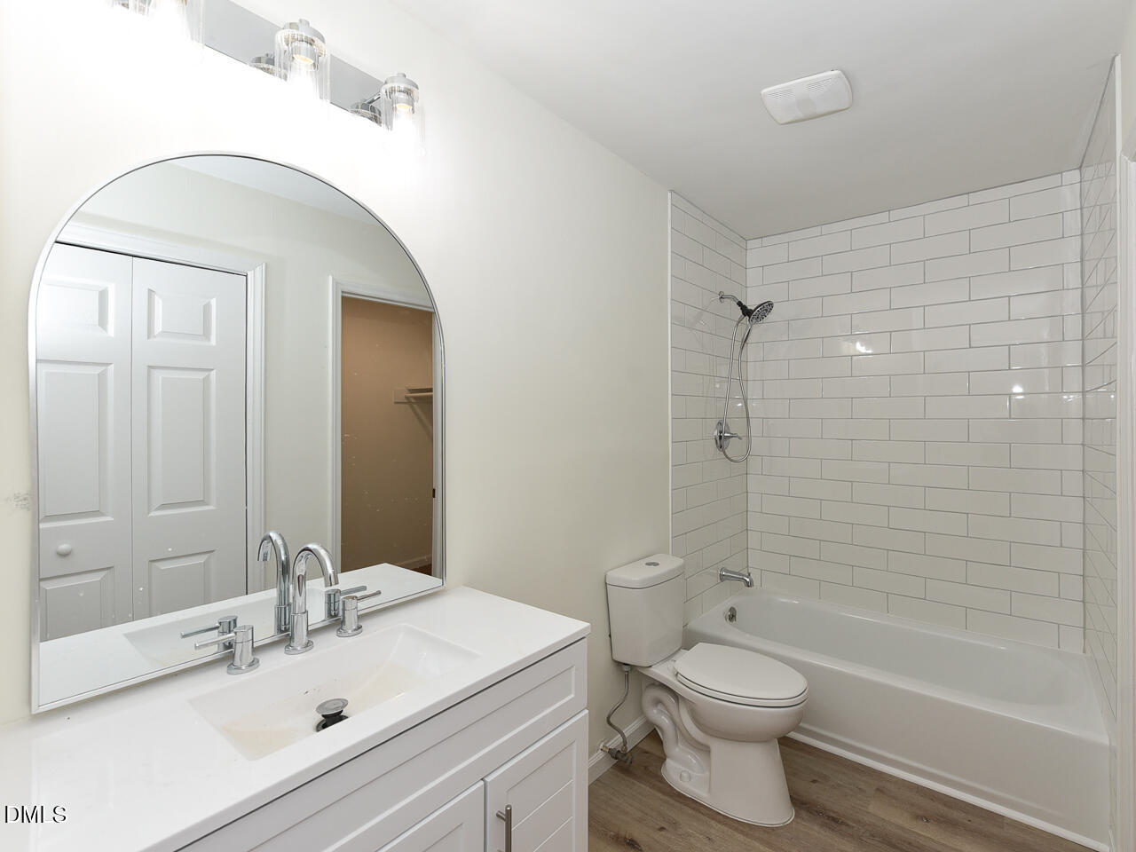 939 Cheves Road Zebulon, NC 27597 - Photo 15 of 21 a bathroom with a sink a toilet and shower