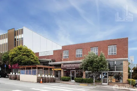 a front view of a building with street view