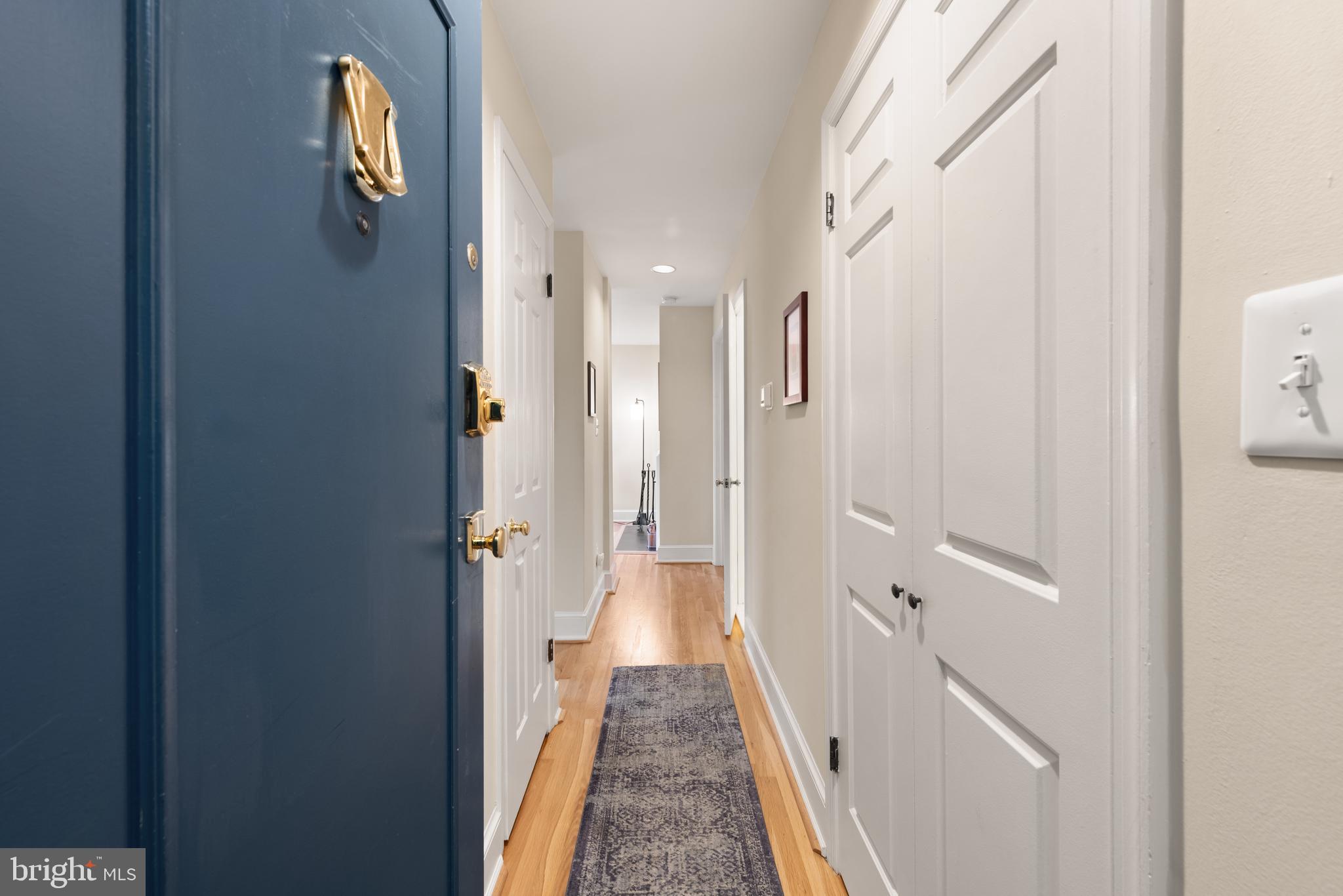 317 10th Street Northeast, Unit 13 Washington, DC 20002 - Photo 3 of 29 a view of a hallway with wooden floor and staircase