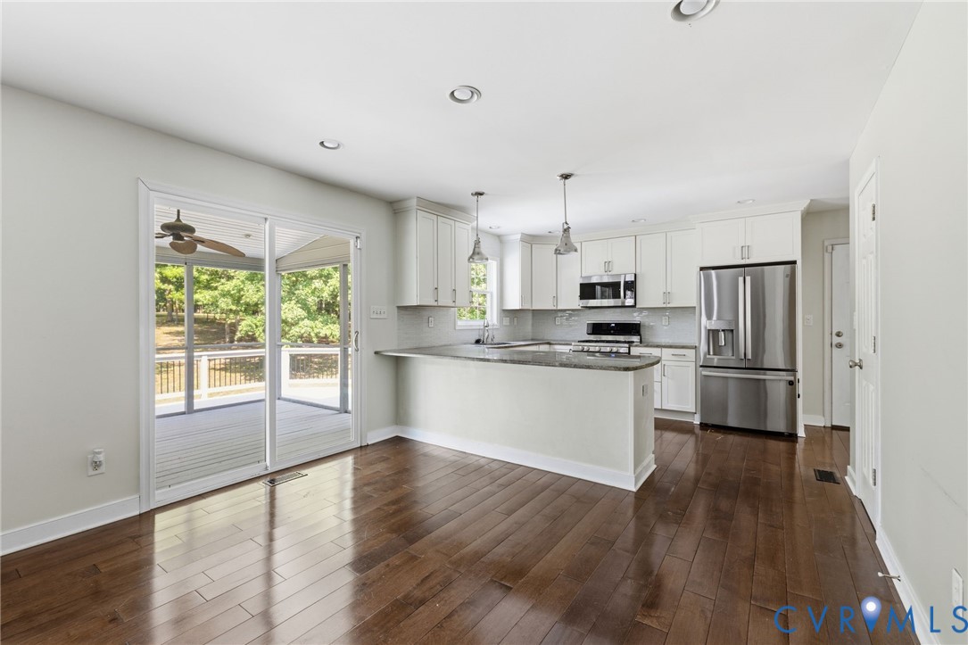 13524 Mountcastle Road Chesterfield, VA 23832 - Photo 11 of 44 Open-concept kitchen and dining area featuring ric